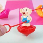 TOYANDONA 10pcs Spinning Tops with Plastic String Launcher Pig Shape Gyroscope Toy Kids Party Favors ( Random Color )